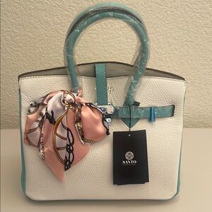 Cream and teal blue trim hand bag